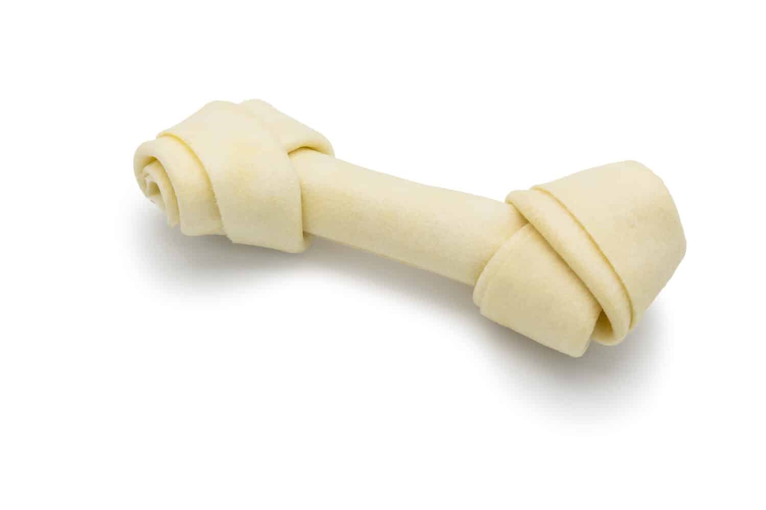 Osso di cane isolato su priorità bassa bianca