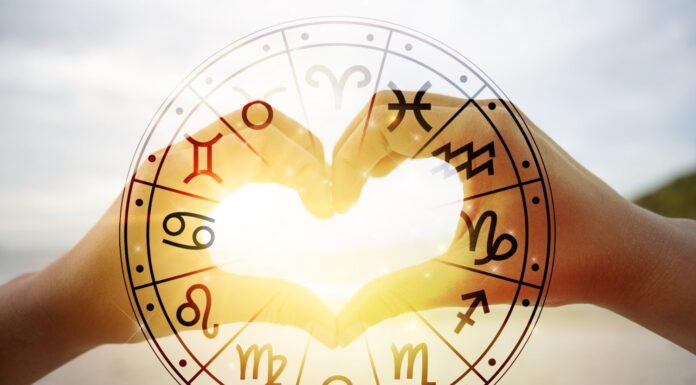 Le mani delle donne e degli uomini sono a forma di cuore con la luce del sole che passa attraverso le mani e hanno simboli astrologici