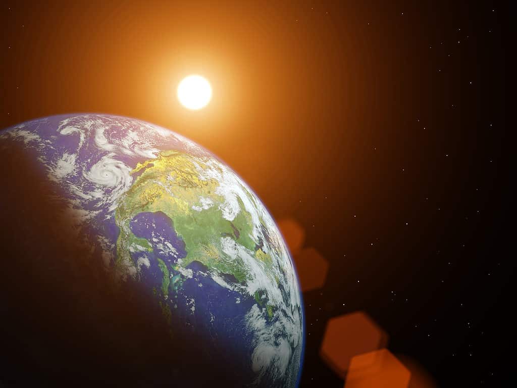 Il pianeta Terra e il Sole nello spazio