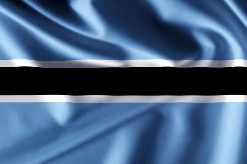Illustrazione della bandiera sventolante 3D del Botswana.  La trama può essere utilizzata come sfondo.