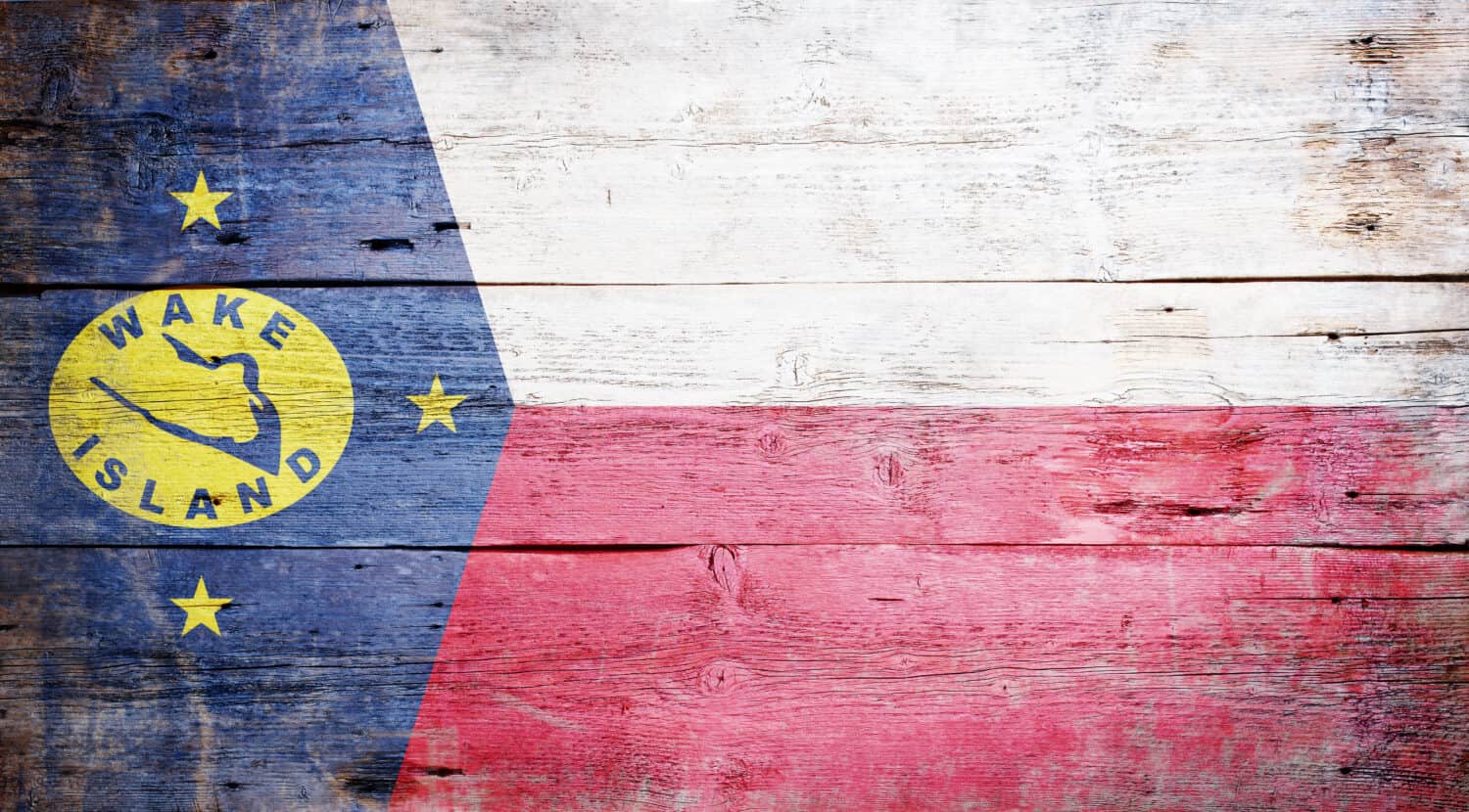 Bandiera dell'isola di Wake dipinta su sfondo di plancia di legno grungy