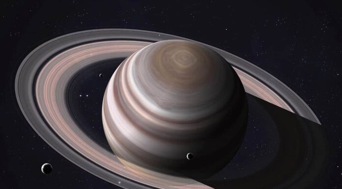 Ripresa colorata che mostra parte di Saturno e dei suoi anelli illuminati dai raggi del sole.  Elementi di questa immagine forniti dalla NASA.