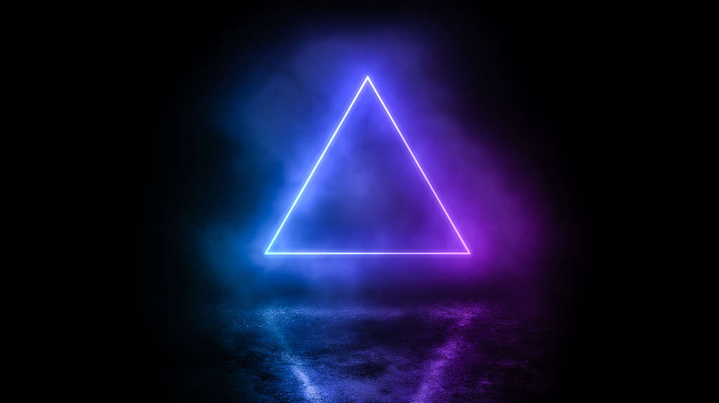 Portale mistico del triangolo al neon sospeso su un pavimento di cemento