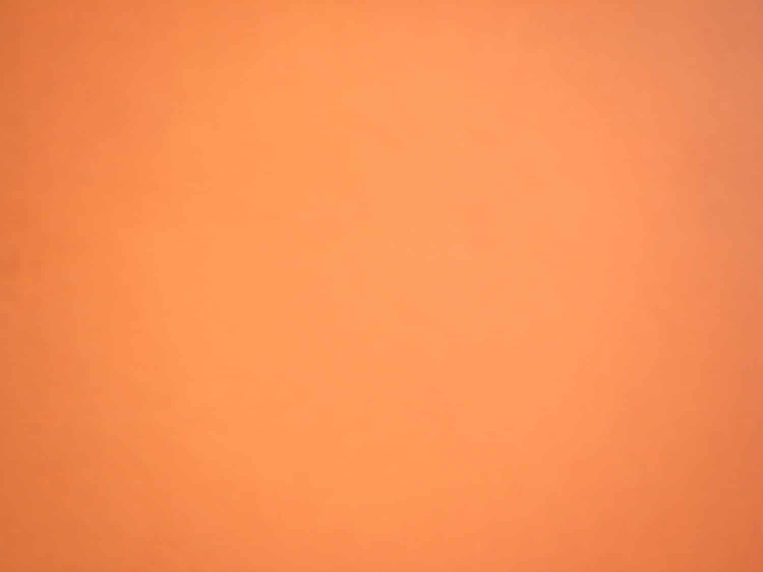 Sfocatura dello sfondo di colore arancione Atomic Tangerine