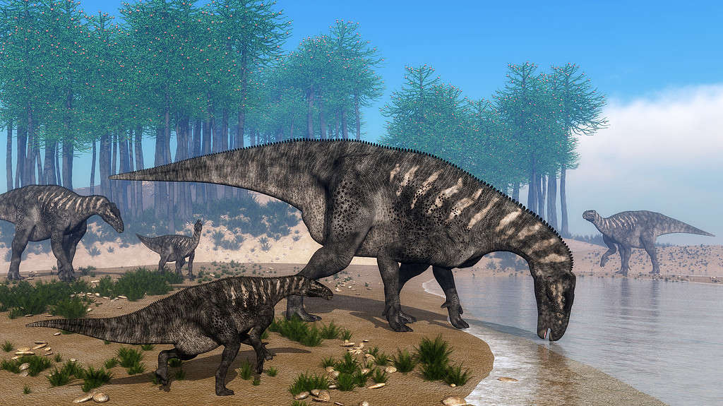 Mandria di dinosauri Iguanodon sulla costa - rendering 3D