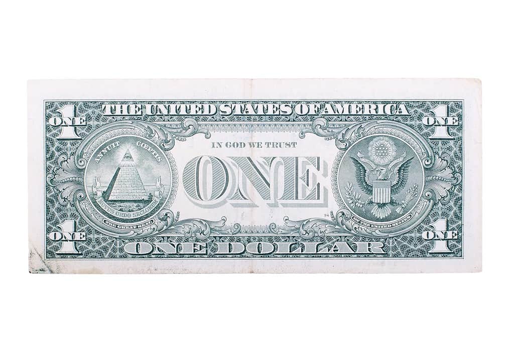 La denominazione di un dollaro sul retro, isolata su sfondo bianco