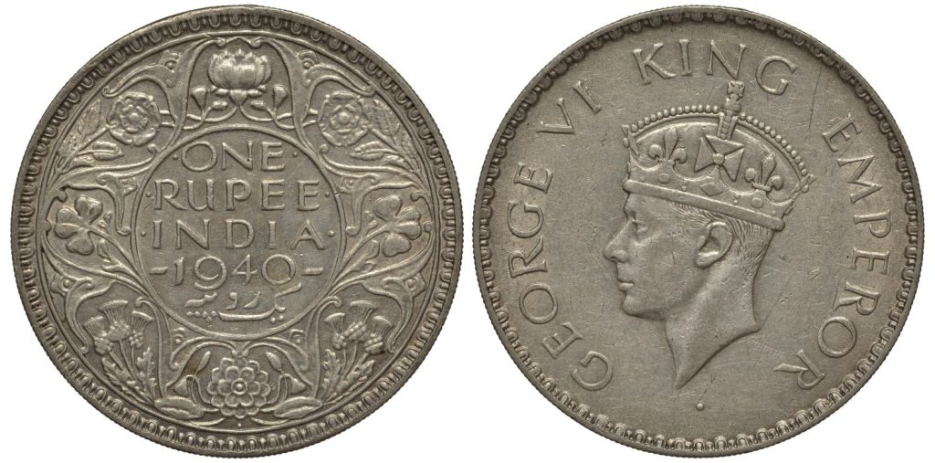 Moneta dell'India britannica da una rupia 1940, ornamento floreale, denominazione al centro, Re Giorgio VI testa a sinistra, epoca coloniale, argento,
